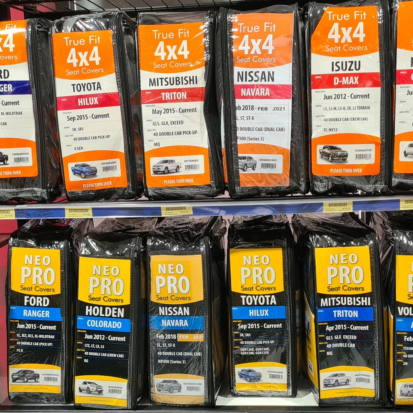 Shelf of True Fit and Neo Pro 4x4 seat covers sorted by vehicle